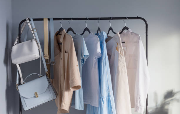 Light colored womens summer clothes on hanger